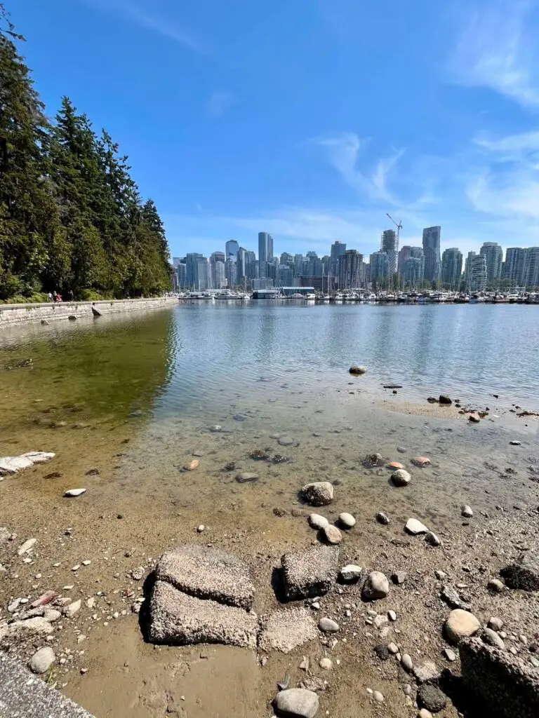 Vancouver skyline from Stanley Park seawall on a sunny day