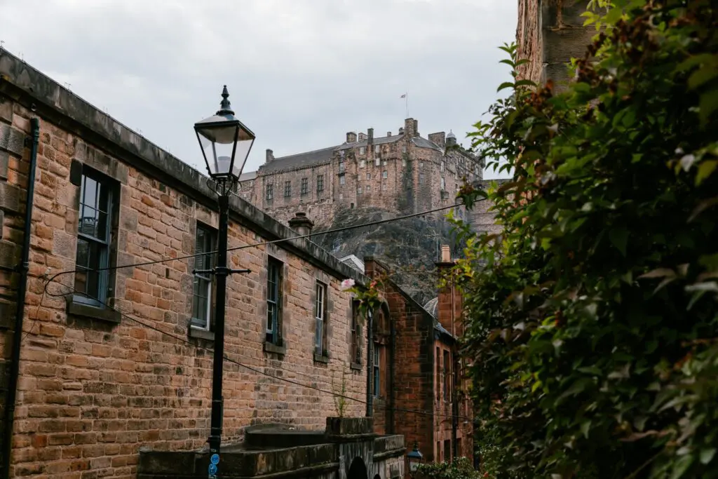 Edinburgh Castle from a narrow street with old stone buildings